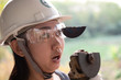 © Thicha - Wear safety glasses saved this technician woman is eye while working because plugin cutting disc metal is broken, Dangers of using power tools, Safety first concept