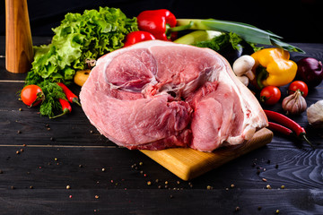 Wall Mural - Raw pork meat. Fresh steaks tenderloin on wooden cutting board