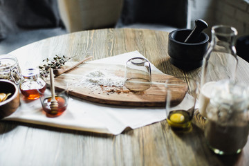 still life kitchen table, wooden board, vase