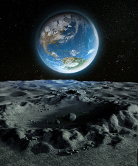 blue planet earth from a crater on the moon's surface