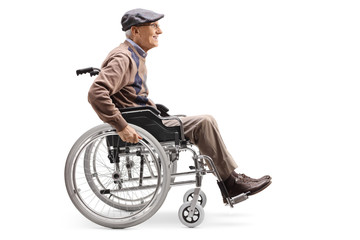 Poster - Senior man manually riding a wheelchair