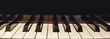 Learn how to play piano. Close up view of black and white piano keys. Musical instrument