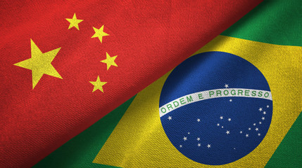 Poster - China and Brazil two flags textile cloth, fabric texture