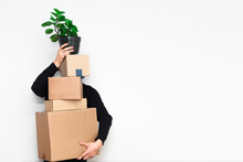 Man With Box Moving In A New Apartament. Moving Concept.