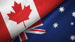© Oleksii - Canada and Australia two flags textile cloth, fabric texture