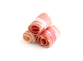 Wall Mural - Slices of bacon on a white background. Raw rolled bacon on a white background.