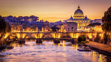 The Dome Of Saint Peters Basilica And Vatican City At Sunset. Sant'Angelo Bridge Over The Tiber River. Rome, Italy