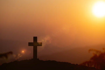 Resurrection concept:Crucifixion Of Jesus Christ Cross At Sunset