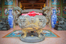 Beautiful Dragon Sculpture On Incense Pot Burner In The Public Chinese Temple.