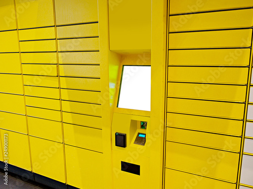 Download Electronic Locker Yellow Automated Parcel Terminal Parcel Locker Post Terminal E Locker On The Street With Empty Screen For Mockup Home Delivery Stock Photo Adobe Stock