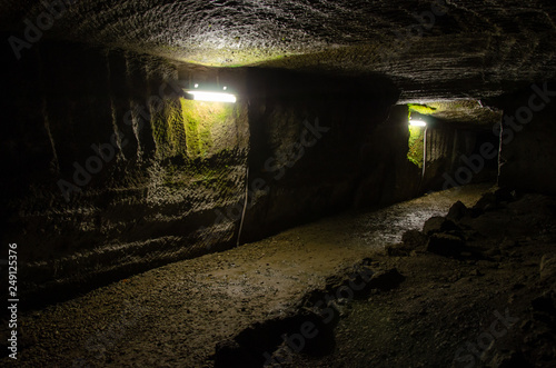 静岡県賀茂郡松崎町の室岩洞内です かつて 伊豆石 を採掘していた坑道です 千石船で運搬していた為 海側に通じており 安城岬や大鐘山 松崎 新港が望めます 天気が良ければ 駿河湾から富士山も望めます Stock Photo Adobe Stock