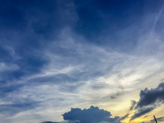 Wall Mural - Sunset with soft blue sky late afternoon background.  Early morning blue sky and bright clouds with good weather. Sunny day afternoon in early winter create a hazy background effect.