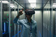© Framestock - Technician works in a data center wearing a VR headset