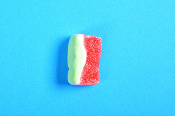 Poster - watermelon candy on blue background