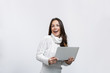 © Etoilestars - beautiful happy young woman in a studio with a laptop