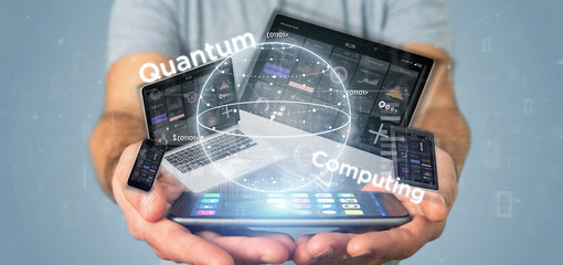 Poster - Businessman holding Quantum computing concept with qubit and devices 3d rendering
