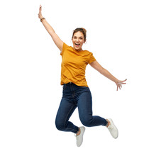 Motion, Freedom And People Concept - Happy Young Woman Or Teenage Girl Jumping Over White Background