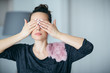 © Etoilestars - Woman closed her eyes wit hands