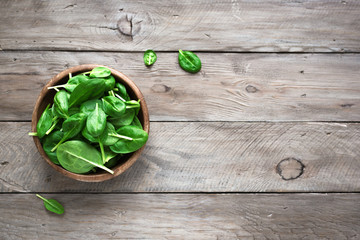 Wall Mural - Green spinach leaves