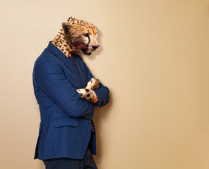 Male cheetah in office clothing suit and shirt