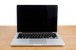 © BGStock72 - Laptop on the work table, white wall background, clipping path inside