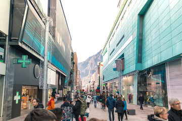 People shopping in a street crowded for Christmas