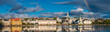 Panoramic view of Reykjavik downtown with lake on Iceland during sunset with rainbow, summer time