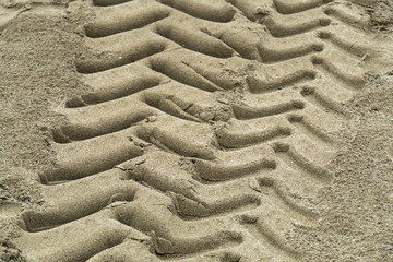 Tire tracks of a truck on the sand