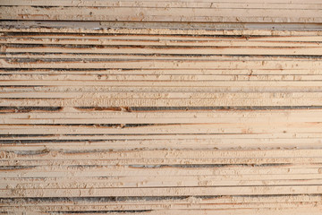 Wall Mural - Timber at work. Lumber stockpiled. The boards are stacked. Boards for sale in stock.