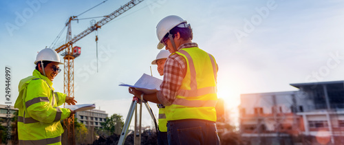 Cuadros en Lienzo Construction engineers discussion with architects at construction site or building site of highrise building with Surveying for making contour plans is a graphical representation of the lay in land