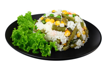 Wall Mural - black plate with white rice, green peas, canned corn kernels, cut green beans isolated on white background