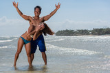 Filipino couple at the beach and yoga poses Stock Photo