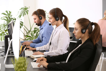 Poster - Technical support agents working in office