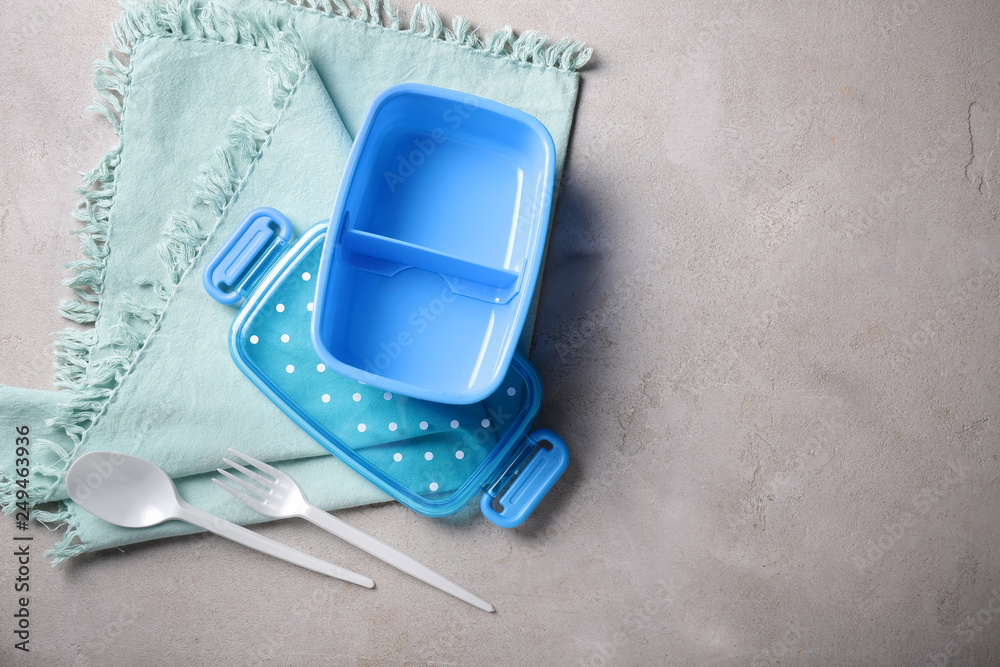 Empty school lunch box on grey background