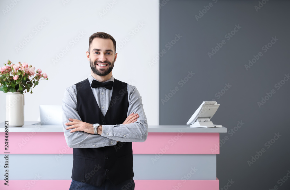 Portrait of male receptionist in hotel