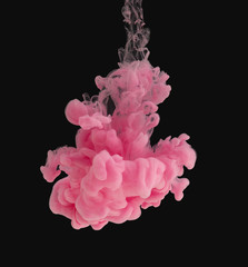 Poster - Pink ink cloud in water isolated on black