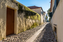 Cobblestone Street In Traditional Neighbourhood In Old Town Cascais Portugal