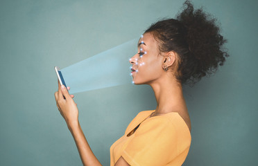 Poster - Woman with smartphone using face ID recognition system