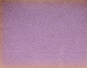 sheet of old rough paper of purple color