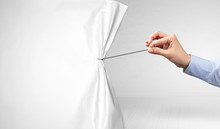 Hand Pulling White Paper Curtain, Changing Scene Concept