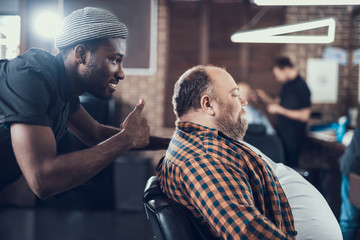 Wall Mural - Hairstylist man show thumb up to client