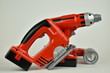 © OV Photography - Battery powered toy tools over solid background