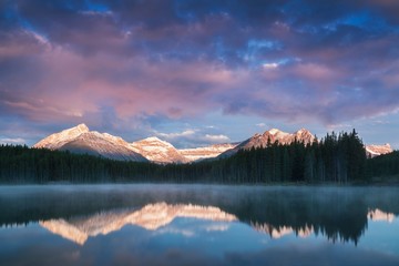 Wall Mural - lake herbert panorama in a foggy morning with glaciers mountain and reflection in banff national par