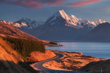 Wall Mural - scenic winding road along lake pukaki to mount cook national park, south island, new zealand during 