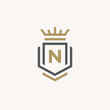 Heraldic Letter N monogram. Elegant minimal logo design. Letter N + Crown + Book + Shield.
