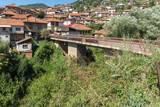 Fototapeta Miasto - Old Medieval Bridge at the center of town of Kratovo, Republic of North Macedonia