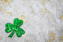 Sequin Shamrock For Understated Fun St. Patrick's Day Background, Flat Lay