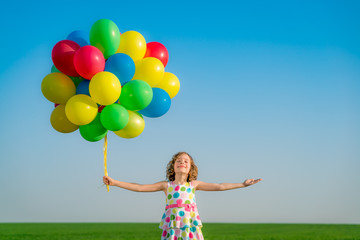 Sticker - Happy child playing outdoors in spring field