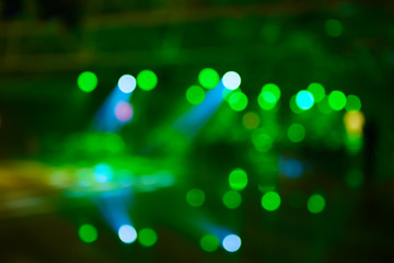 blurred background of event concert lighting at conference hall