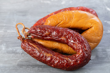 Poster - portuguese smoked sausages on ceramic background